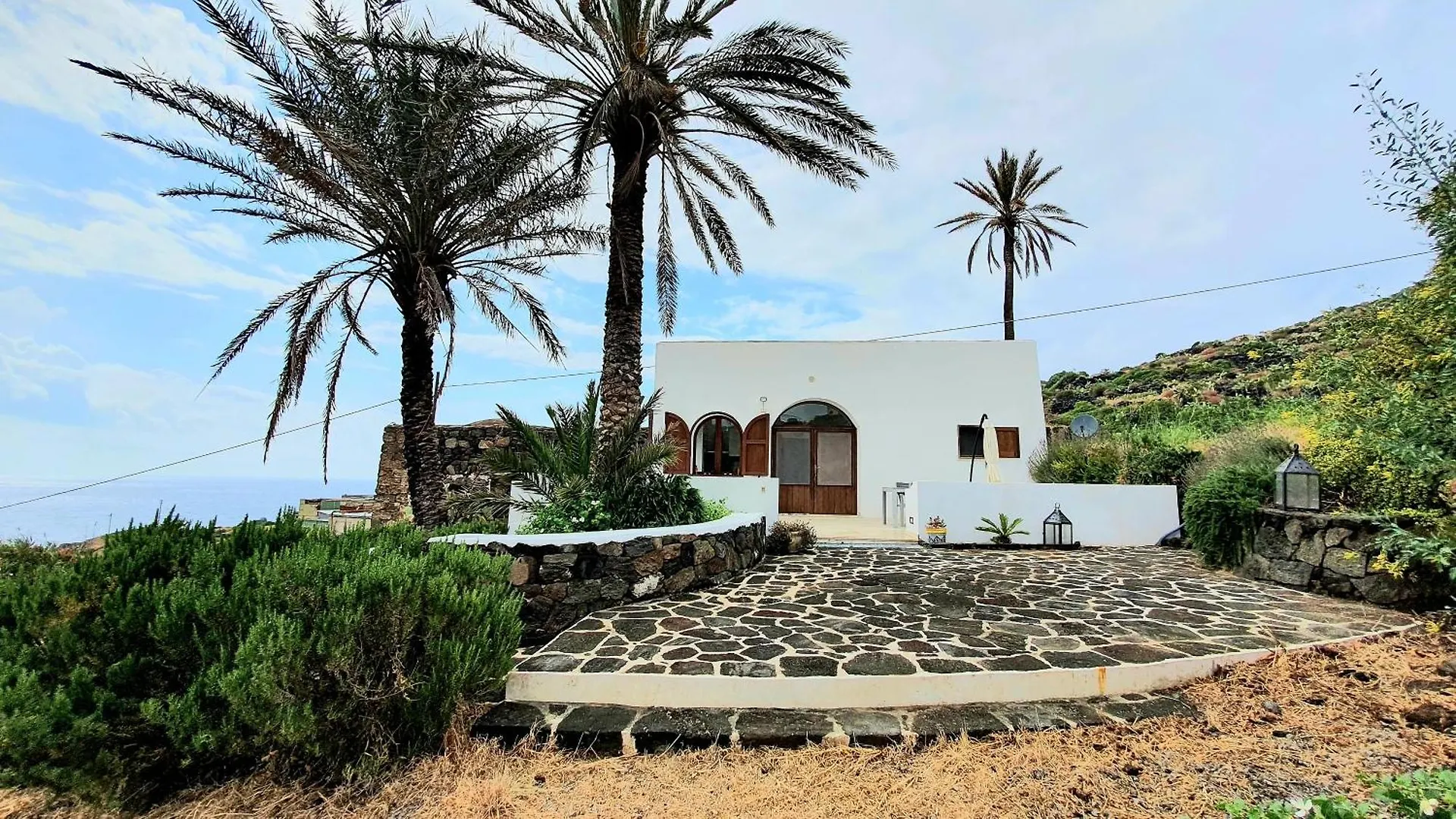 Radyshams Dammusi Le Palme & Bait Villa Siba Olaszország